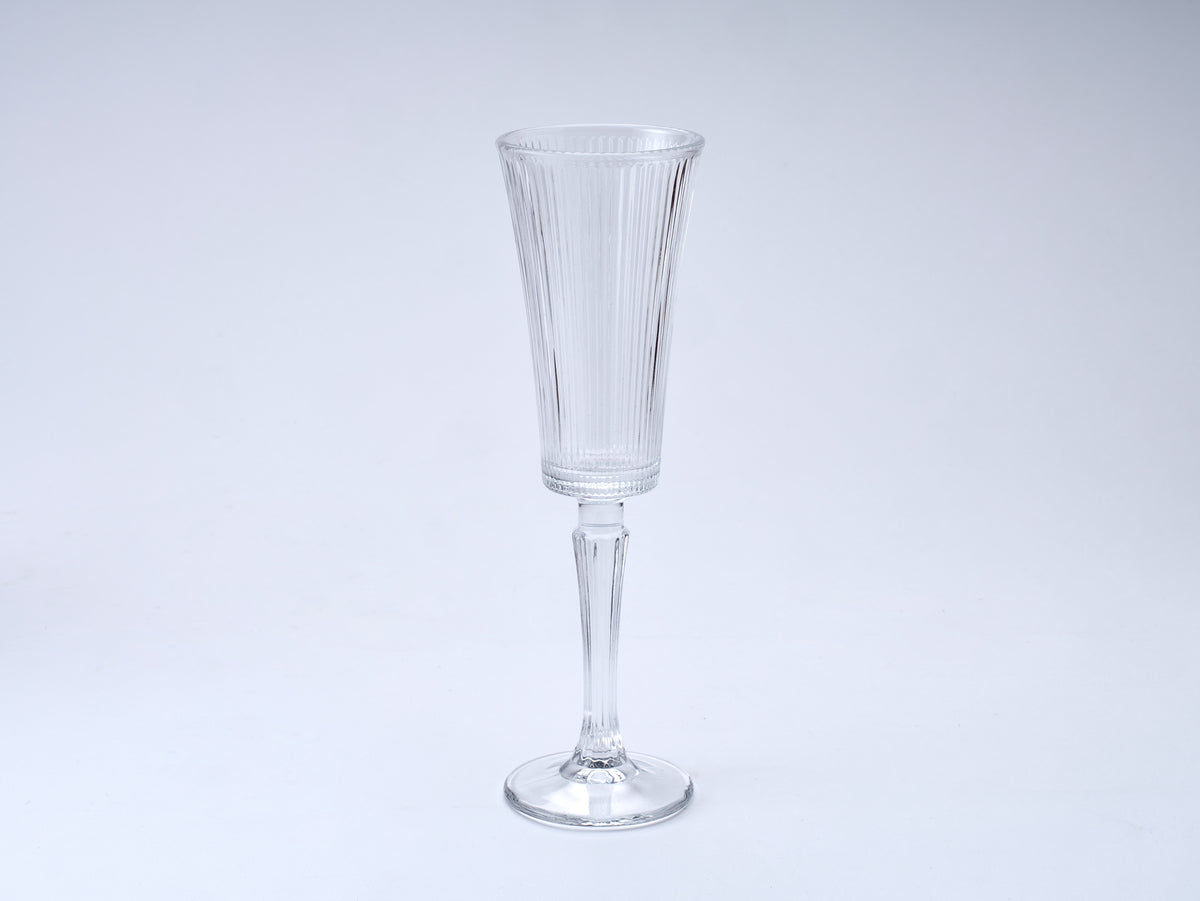 Incognito Champagne Flute with elegant ribbed glass in a speakeasy style, tall decorative stem and theatrical Incognito Spirits gift box.