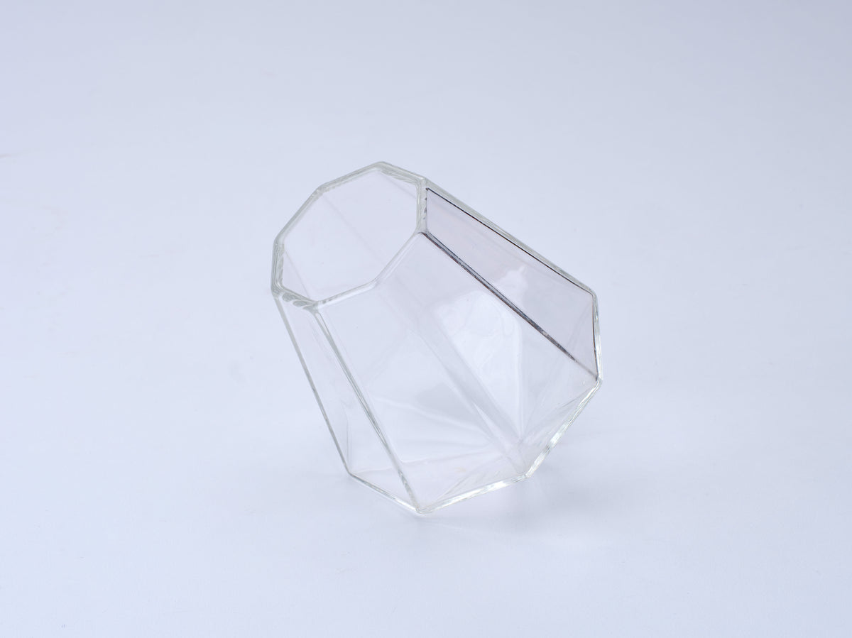 Incognito Diamond Glass, a clear faceted cocktail and spirits glass with a diamond shaped design, presented in an Incognito Spirits gift box.