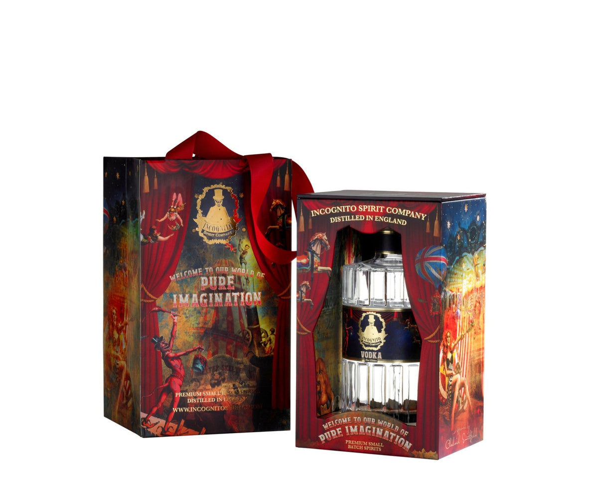 Incognito Spirits premium vodka bottle presented in its illustrated Pure Imagination gift box with matching luxury gift bag and red ribbon handles.